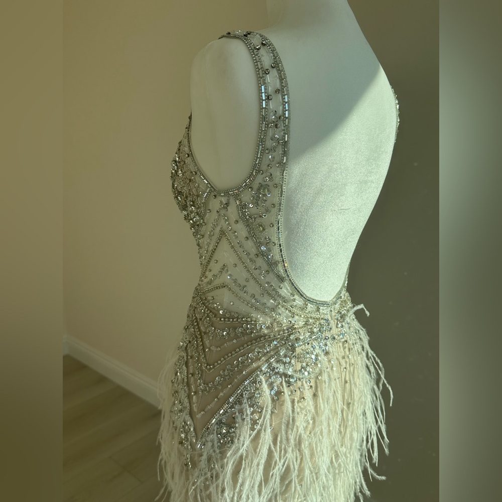 New Jovani 03023 Sheer Embellished Bodice
Feather Gown|Cream|00|Missing Tags - Picture 10 of 17